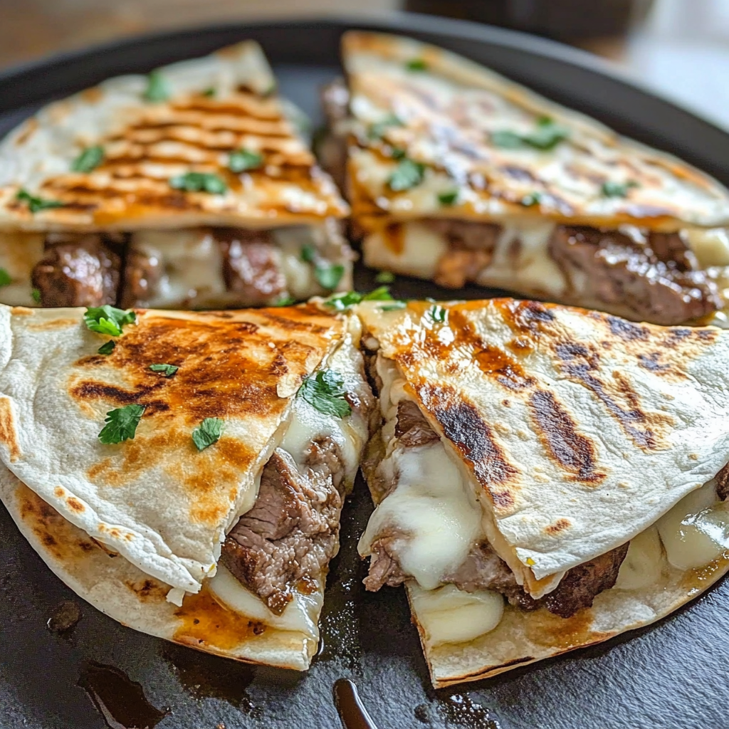 Recipe preparation for Steak Cheese Quesadillas on Blackstone